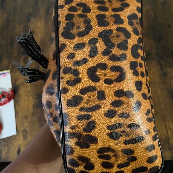 Dooney & Bourke Cheetah Drawstring leather bag; gently used - Picture 4 of 6